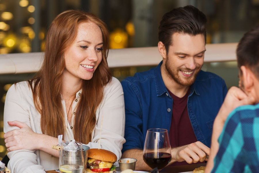 group of friends at a restaurant eating lunch